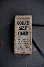 Load image into Gallery viewer, PENDANT - 1918 BLACK &amp; NICKEL PLATE KODAK CAMERA TIMER
